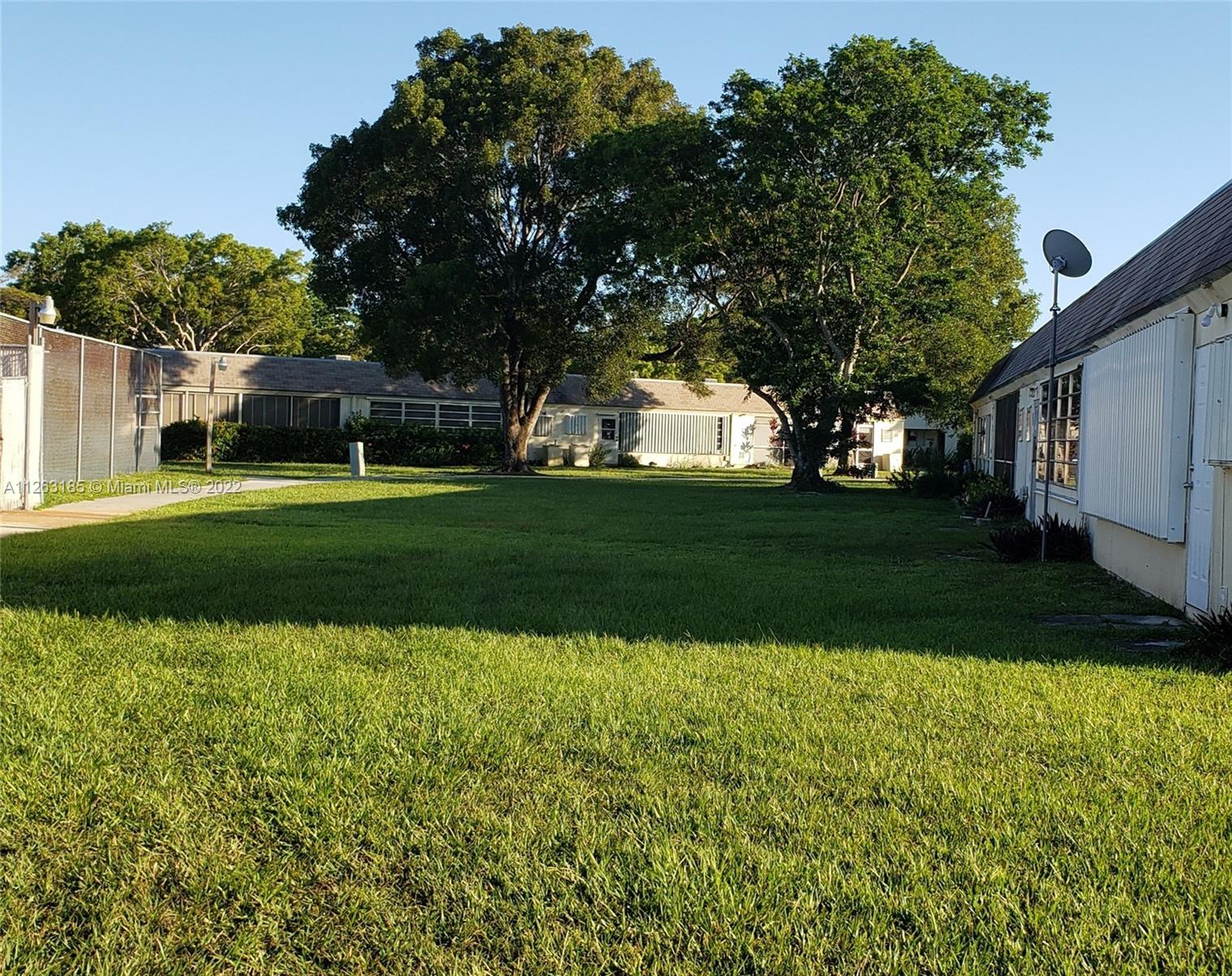 West Perrine Miami, FL 33157 - Photo 26 of 34 a view of a backyard with large trees