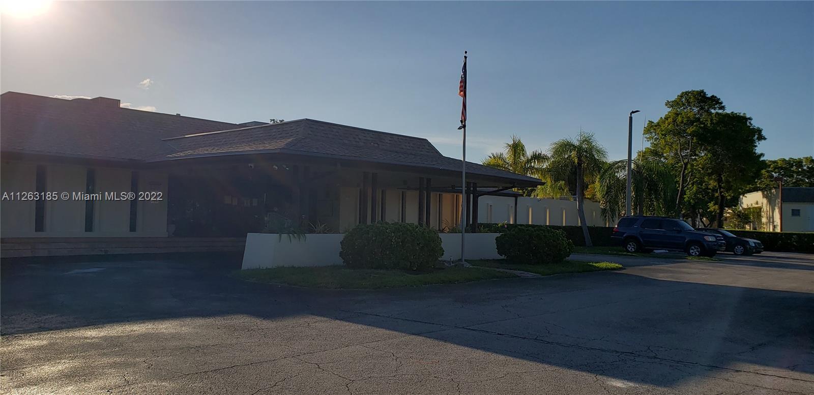 West Perrine Miami, FL 33157 - Photo 27 of 34 a front view of a house with a garden