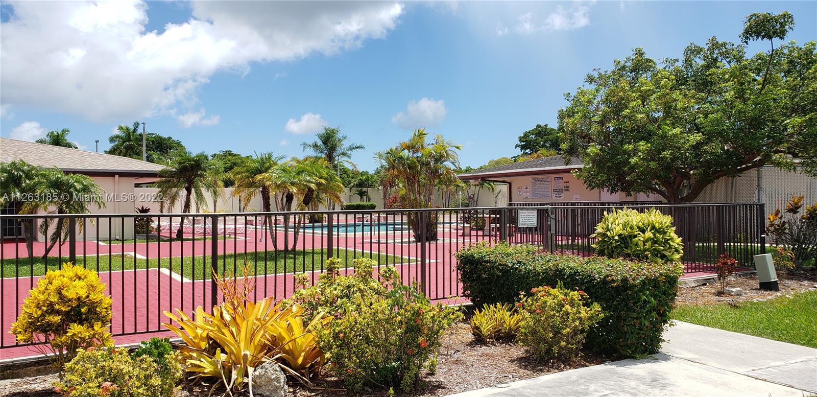 West Perrine Miami, FL 33157 - Photo 29 of 34 a view of a garden filled with lots of flower plants