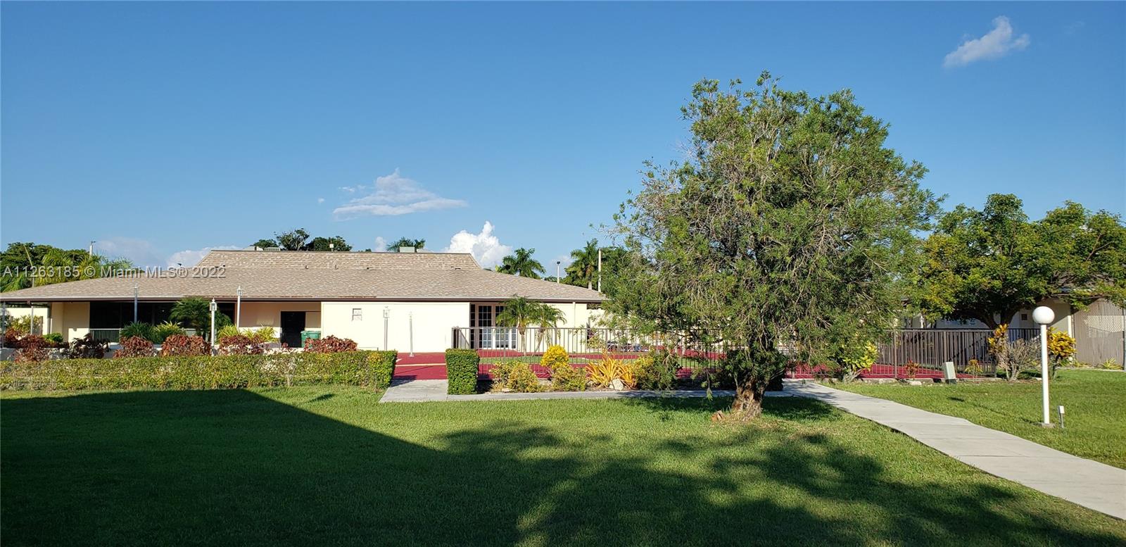 West Perrine Miami, FL 33157 - Photo 30 of 34 a front view of a house with a yard