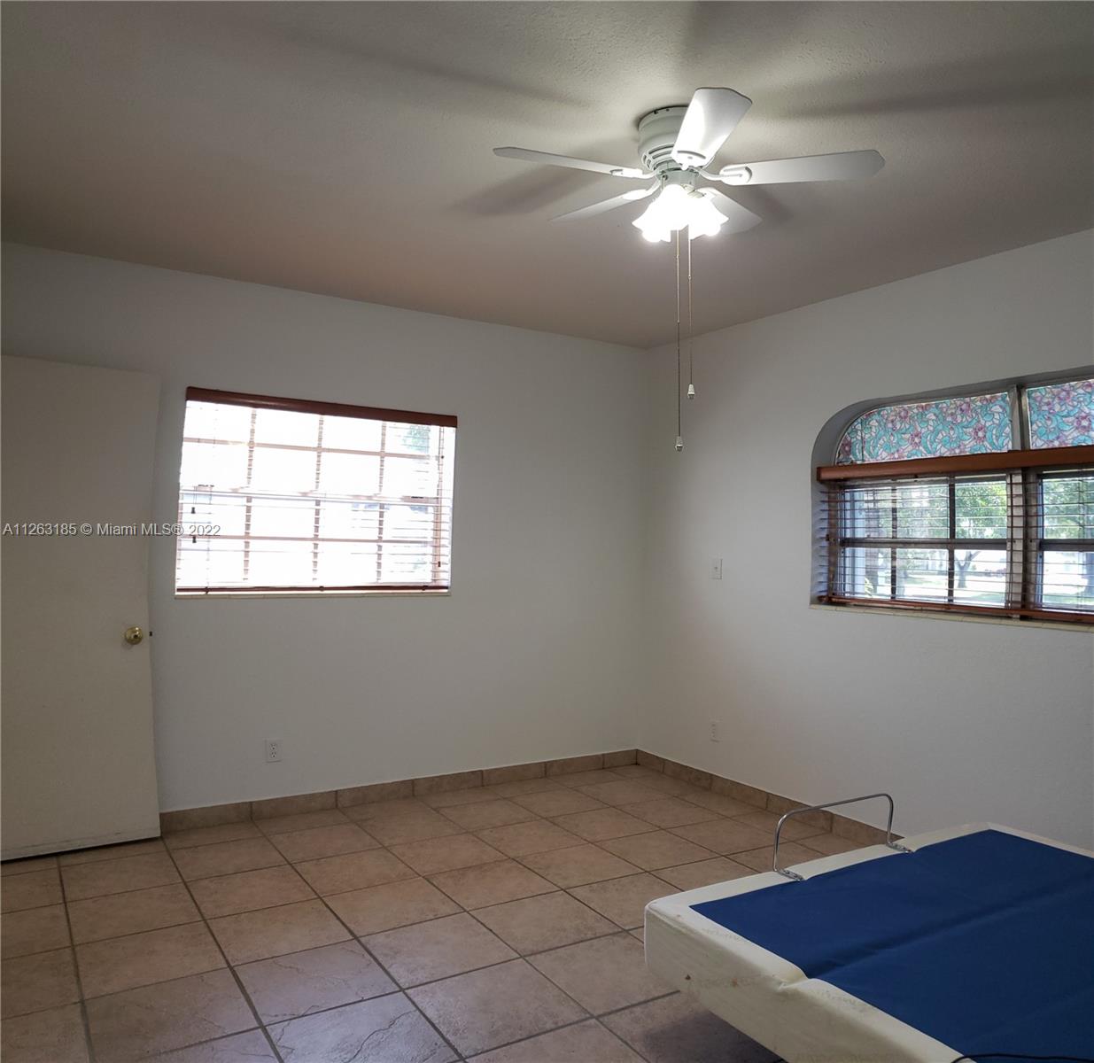 West Perrine Miami, FL 33157 - Photo 9 of 34 a view of a room with windows and ceiling fan
