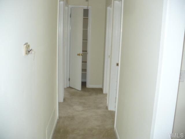 1324 Marlborough Road Raleigh, NC 27610 - Photo 6 of 10 a view of a hallway with closet