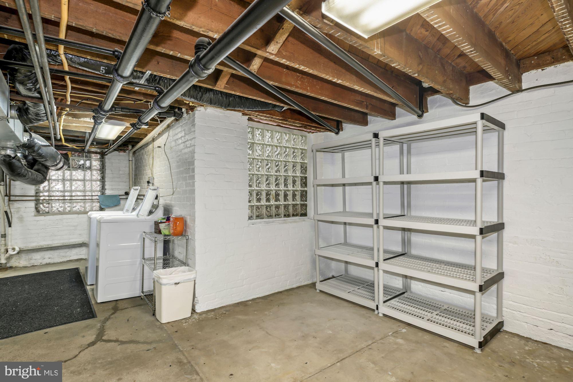 2610 Cathedral Avenue Northwest, Unit 1 Washington, DC 20008 - Photo 21 of 23 Dedicated assigned storage shelving in the basemen