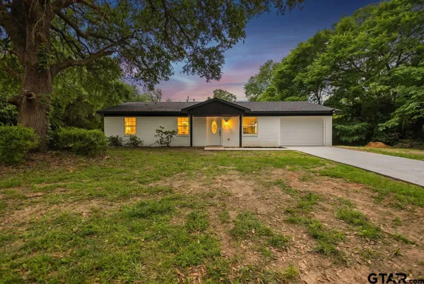 a front view of house with yard