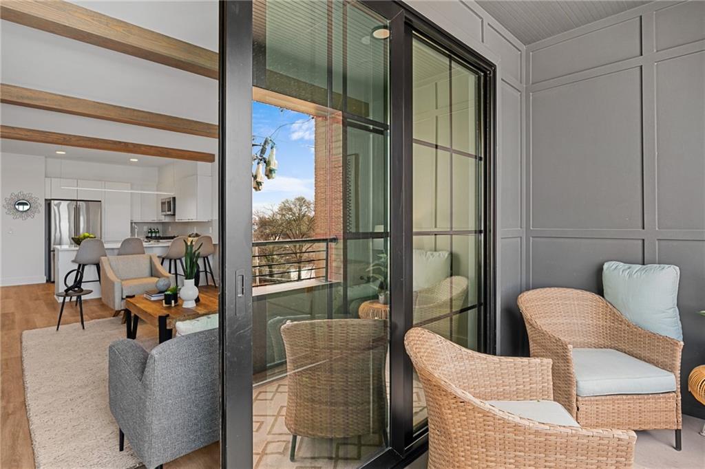a living room with furniture and a window