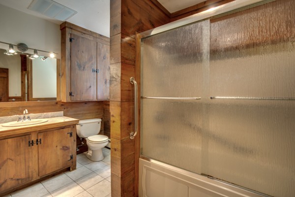 211 Littleton County Road Harvard, MA 01451 - Photo 16 of 30 a bathroom with a sink a toilet and shower