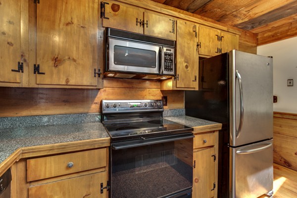 211 Littleton County Road Harvard, MA 01451 - Photo 18 of 30 a kitchen with a refrigerator stove and microwave
