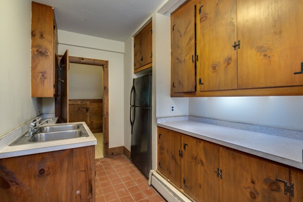 211 Littleton County Road Harvard, MA 01451 - Photo 30 of 30 a kitchen with stainless steel appliances a sink and a refrigerator