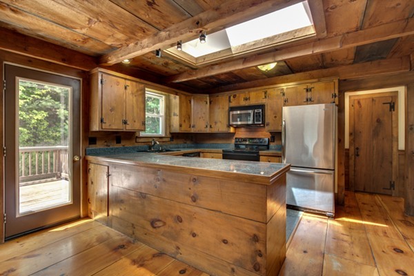 211 Littleton County Road Harvard, MA 01451 - Photo 6 of 30 a kitchen with stainless steel appliances granite countertop a refrigerator and a stove