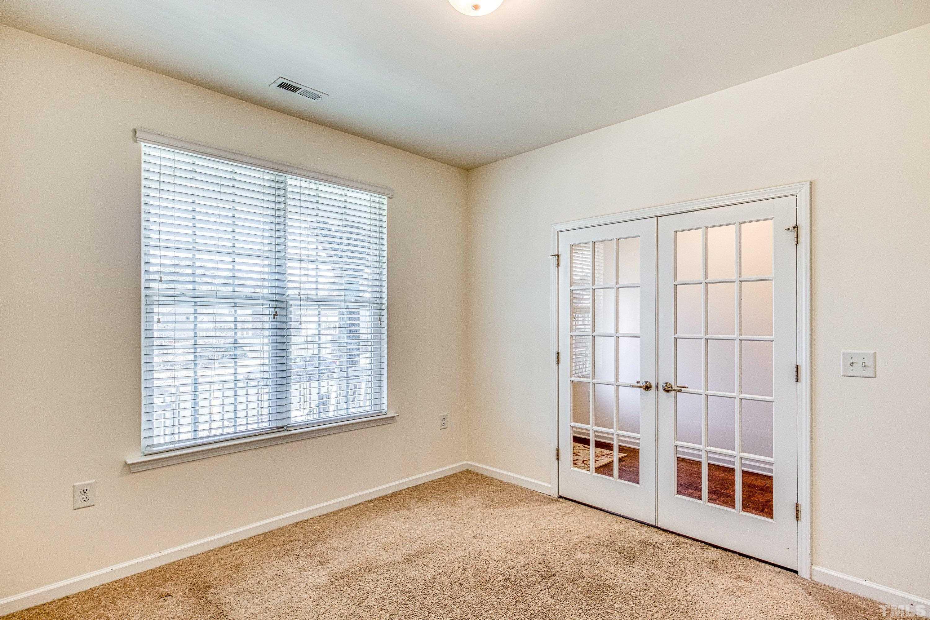 3617 Lily Orchard Way Cary, NC 27518 - Photo 11 of 47 a view of an empty room with a window