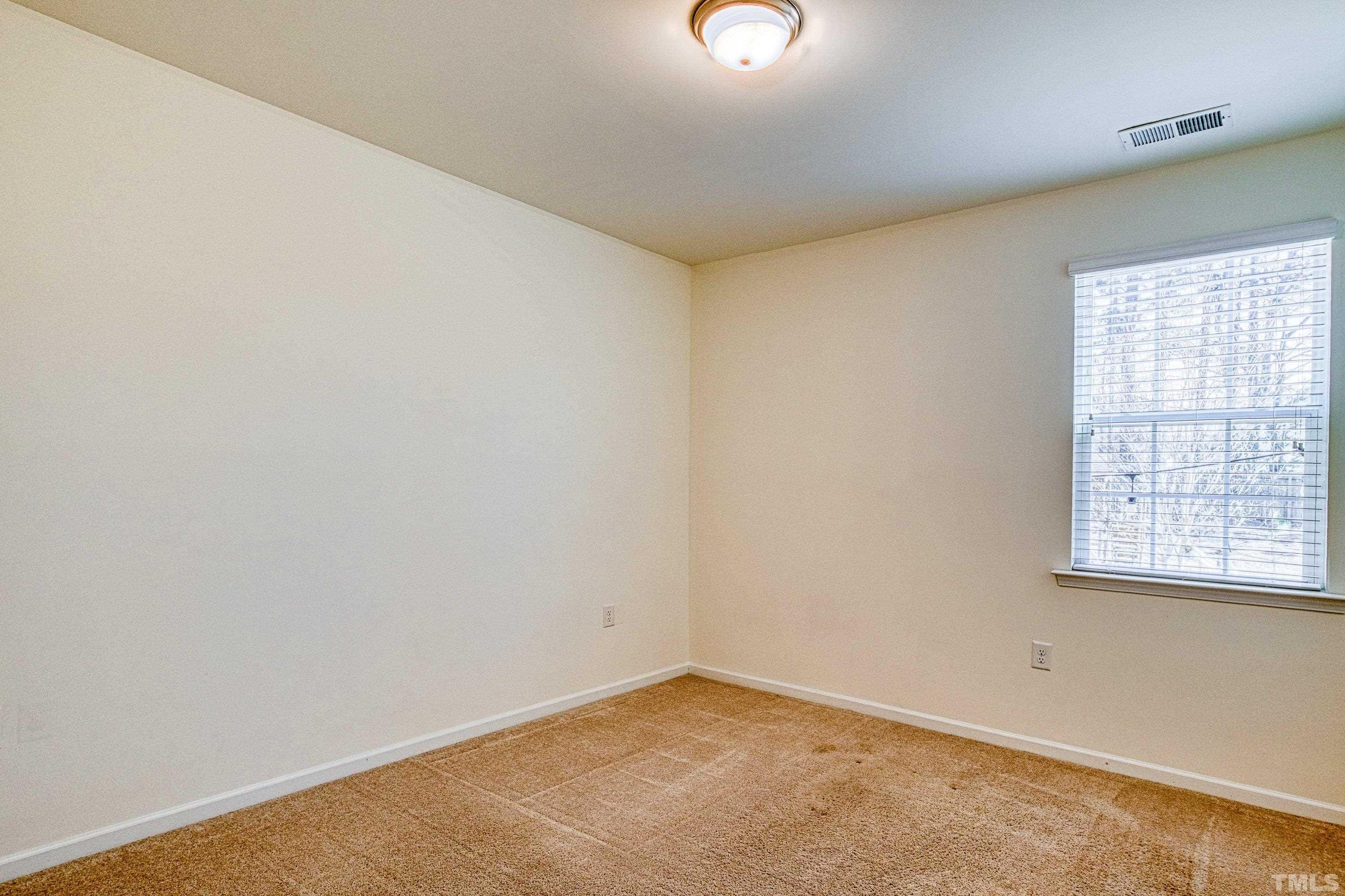 3617 Lily Orchard Way Cary, NC 27518 - Photo 26 of 47 an empty room with a window