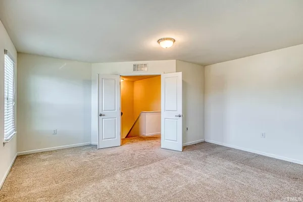 an empty room with a natural light