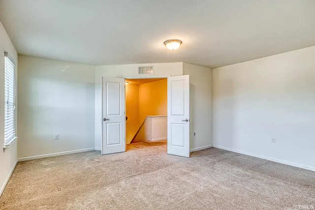 an empty room with a natural light