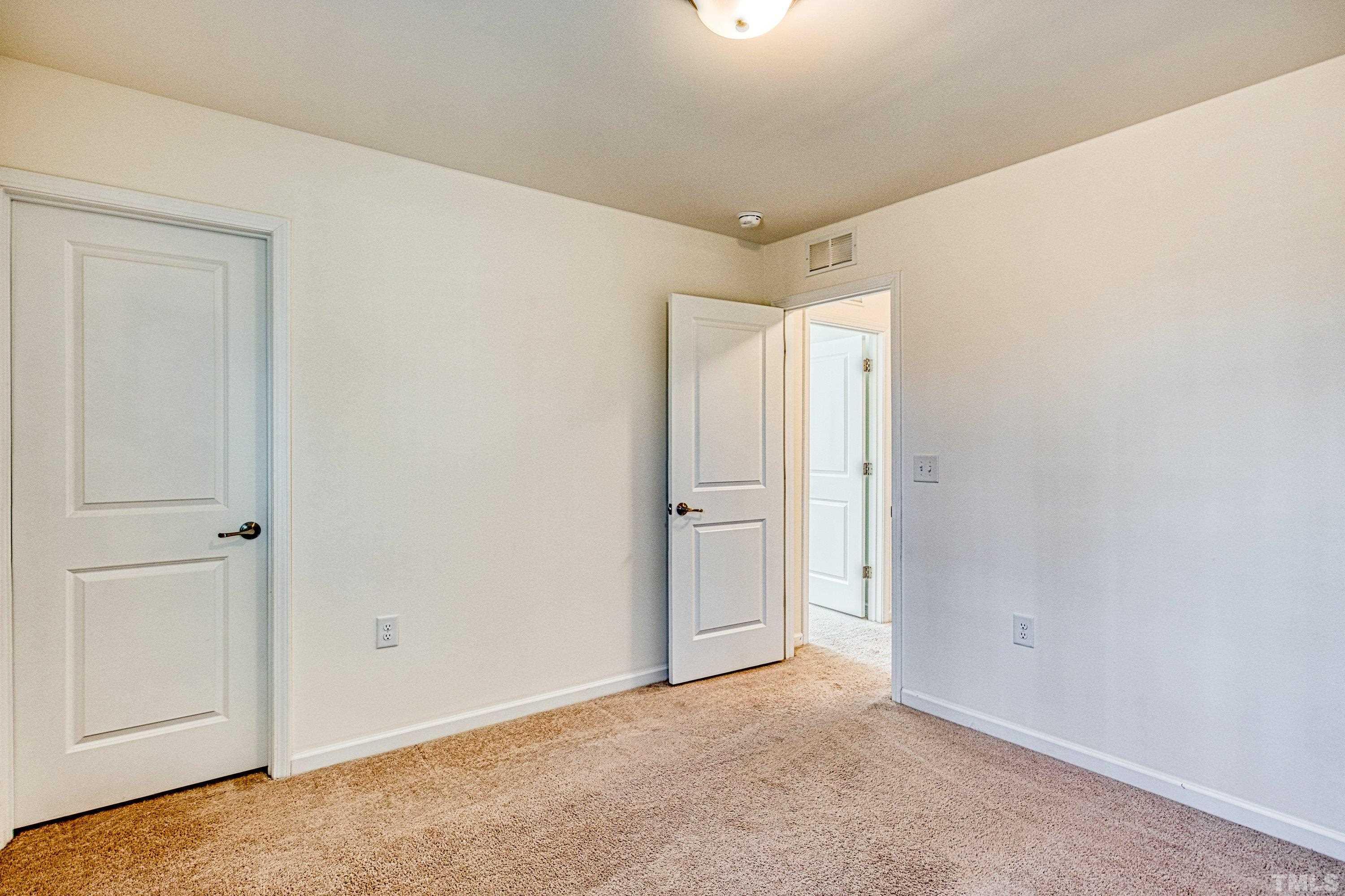 3617 Lily Orchard Way Cary, NC 27518 - Photo 43 of 47 a view of an empty room