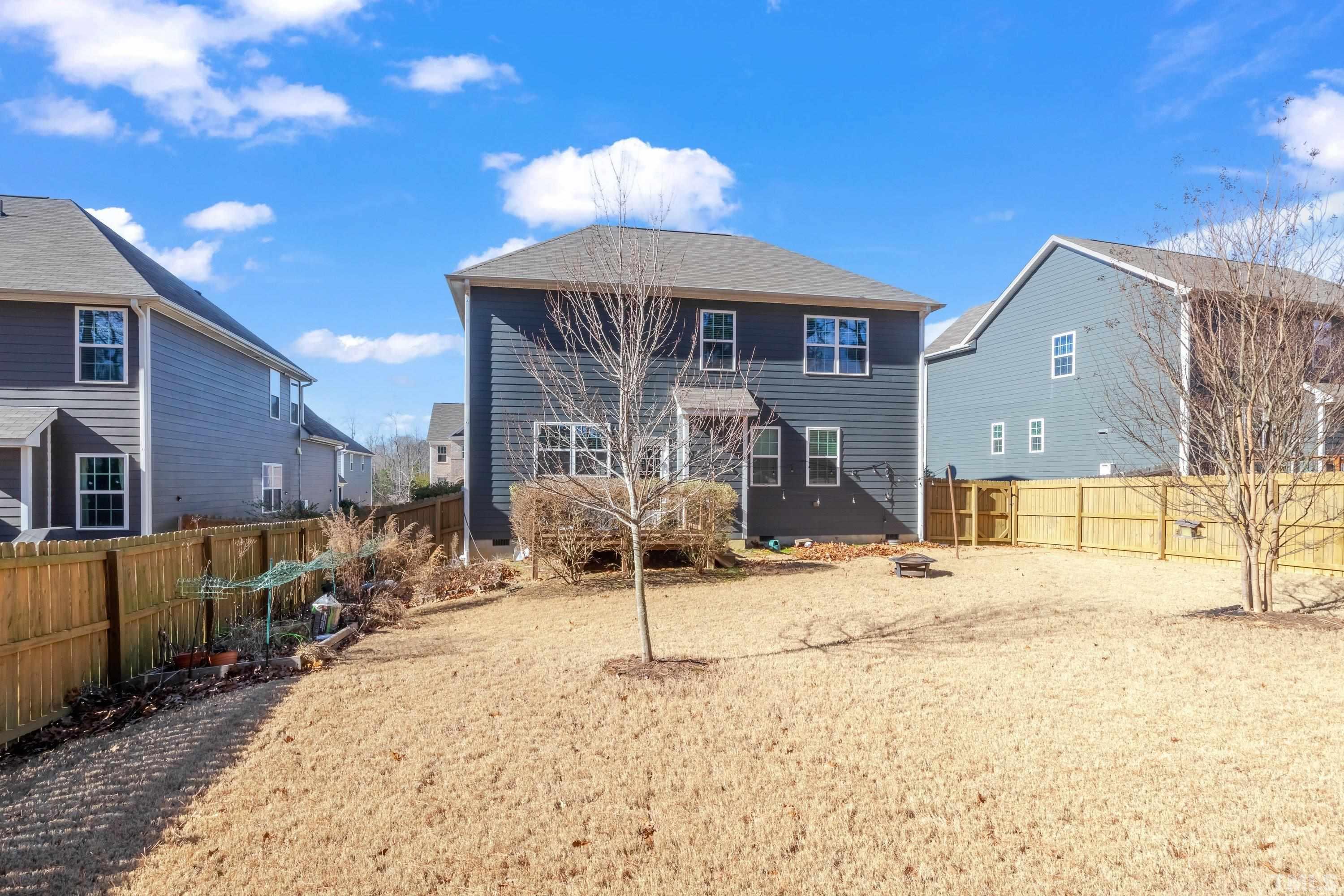 3617 Lily Orchard Way Cary, NC 27518 - Photo 45 of 47 a front view of a house with a yard