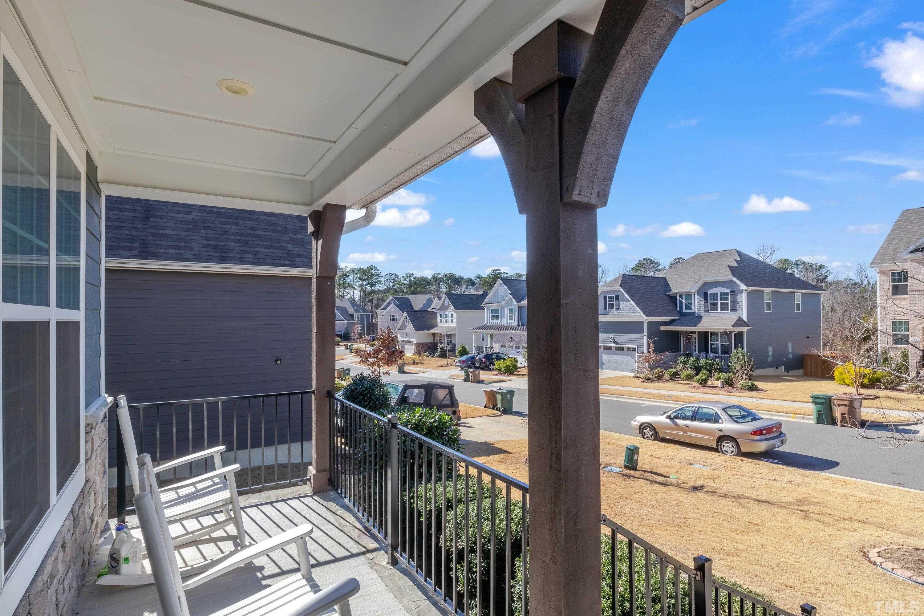 3617 Lily Orchard Way Cary, NC 27518 - Photo 7 of 47 a city view from a balcony