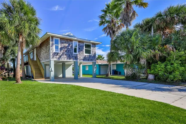 a view of balcony with wooden floor