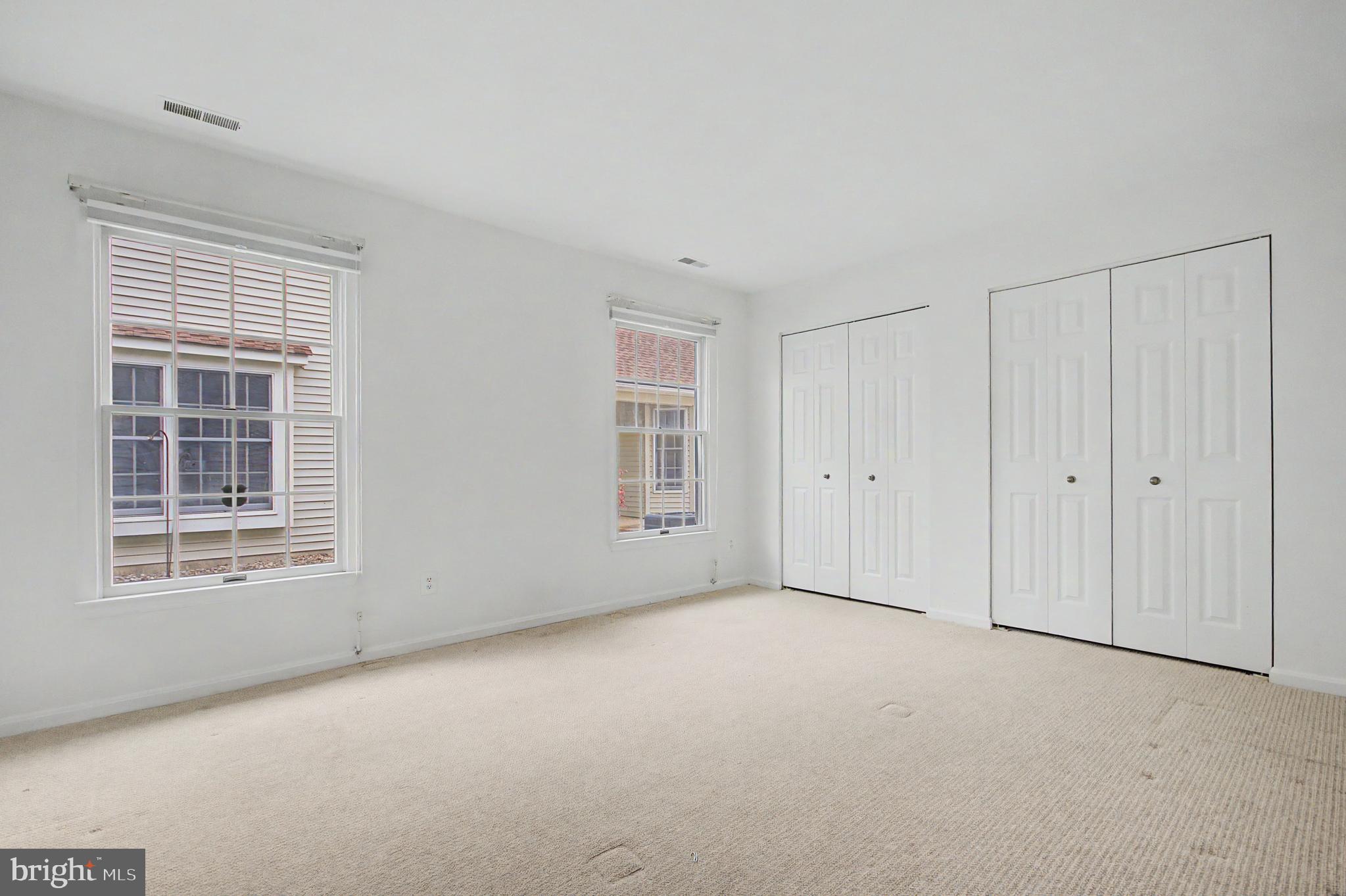 795 Eastern Point Road Annapolis, MD 21401 - Photo 13 of 38 a view of an empty room with a window