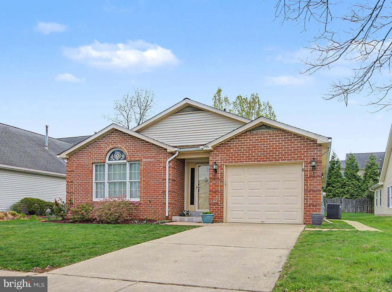 795 Eastern Point Road Annapolis, MD 21401 - Photo 2 of 38 a front view of a house with a yard