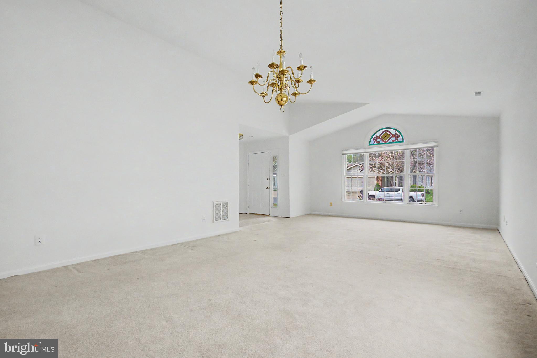 795 Eastern Point Road Annapolis, MD 21401 - Photo 3 of 38 a view of an empty room with a window
