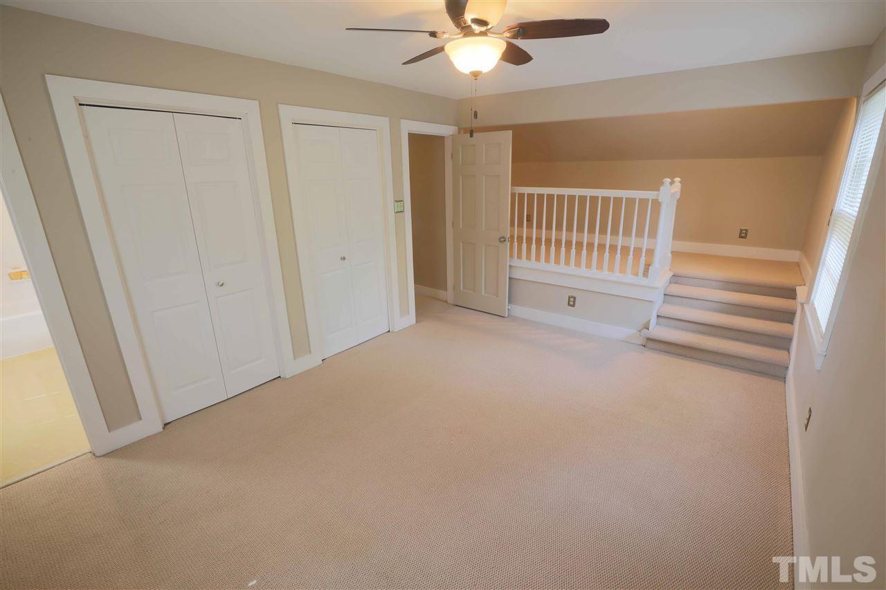 2017 Mallard Lane Raleigh, NC 27609 - Photo 20 of 25 a view of a livingroom with a ceiling fan and window