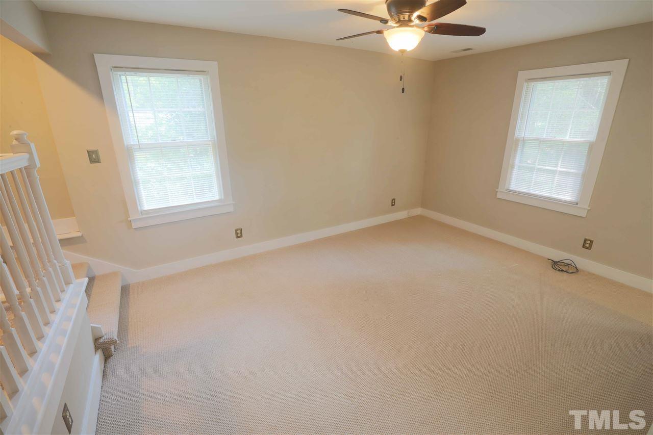 2017 Mallard Lane Raleigh, NC 27609 - Photo 21 of 25 a view of an empty room with a window