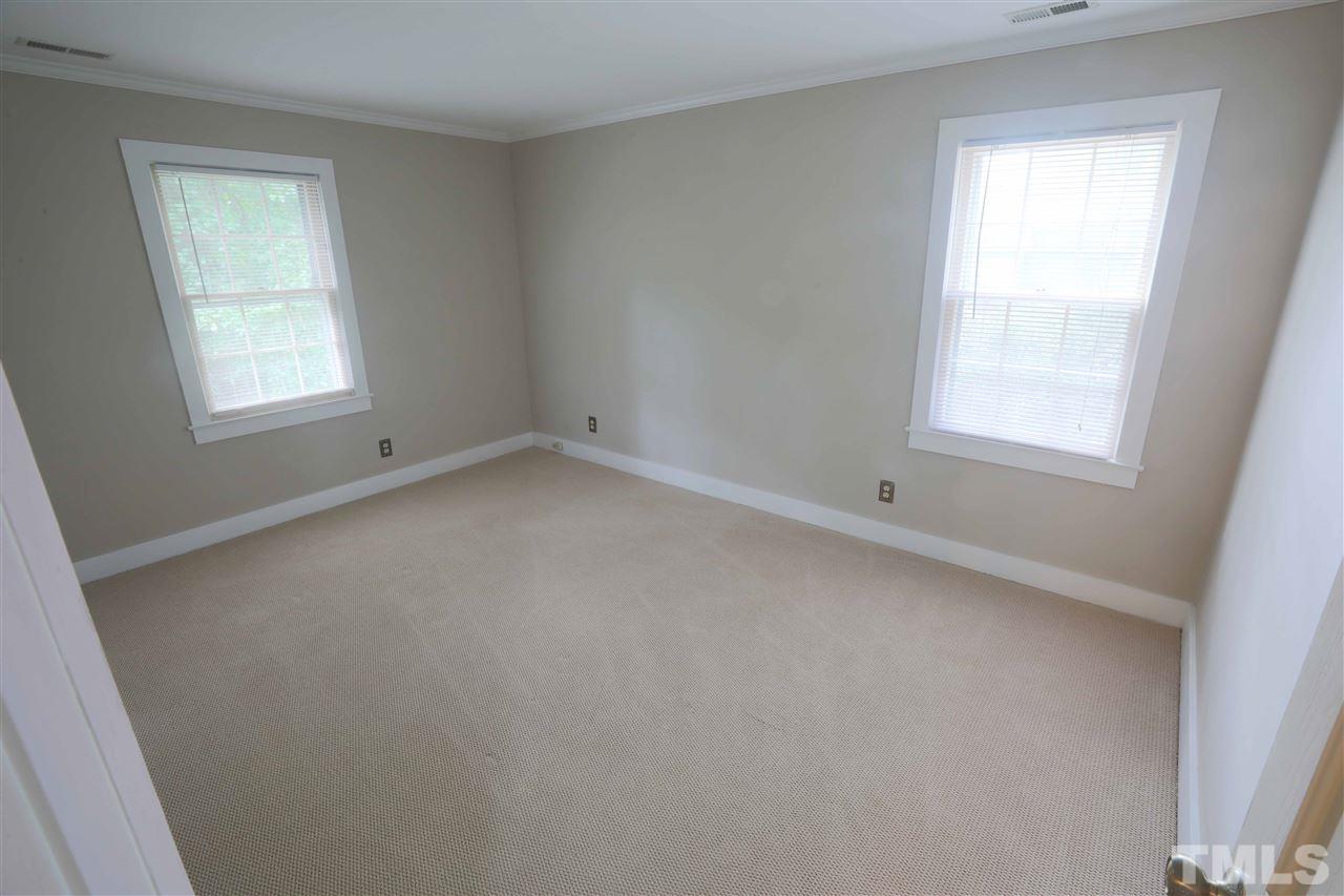 2017 Mallard Lane Raleigh, NC 27609 - Photo 23 of 25 an empty room with a window