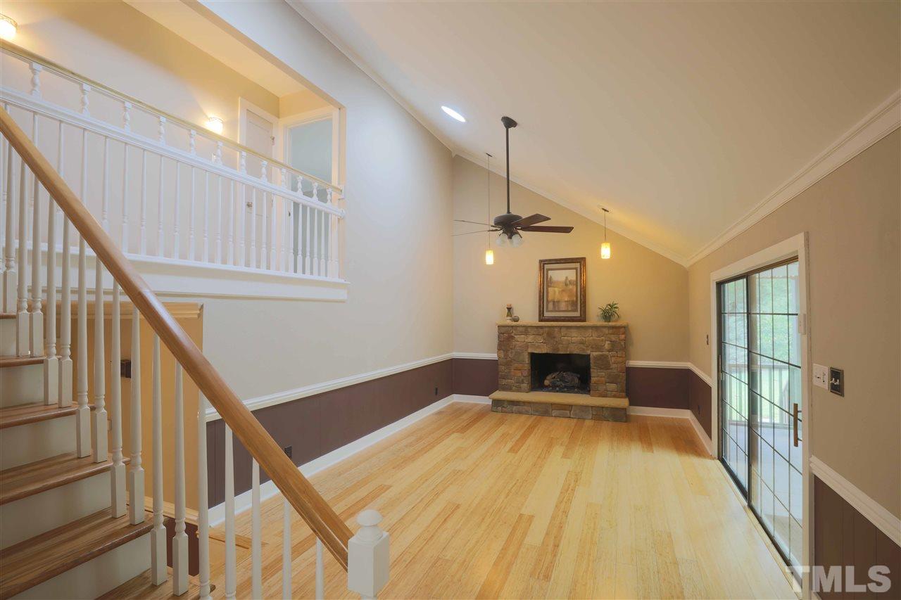 2017 Mallard Lane Raleigh, NC 27609 - Photo 4 of 25 a living room with furniture and a fireplace