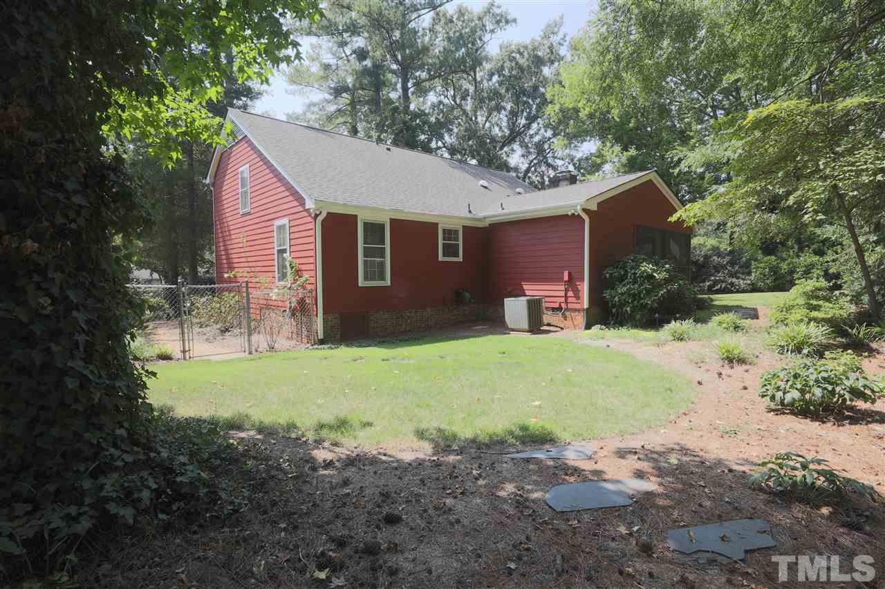 2017 Mallard Lane Raleigh, NC 27609 - Photo 8 of 25 a view of a yard in front of a house with large tree
