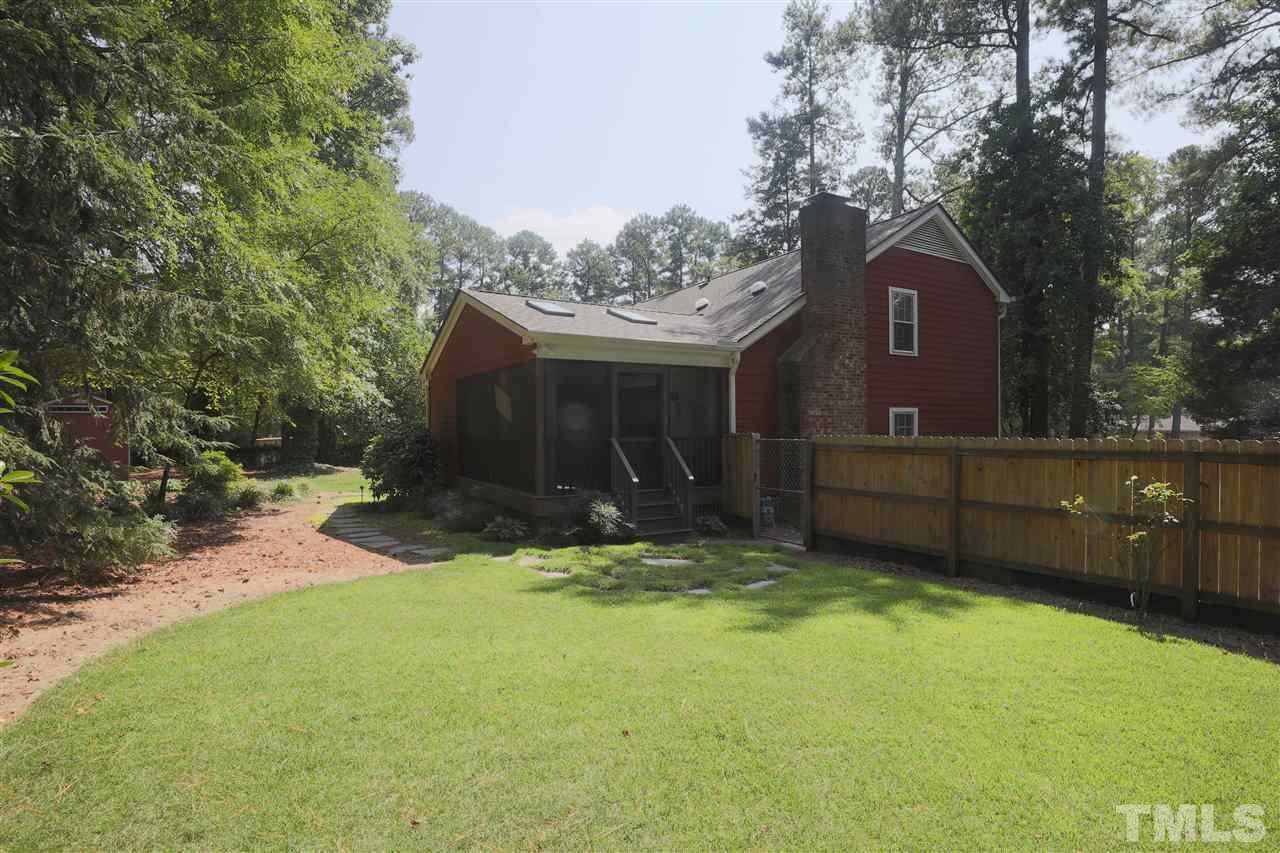 2017 Mallard Lane Raleigh, NC 27609 - Photo 9 of 25 a view of a house with a yard and tree