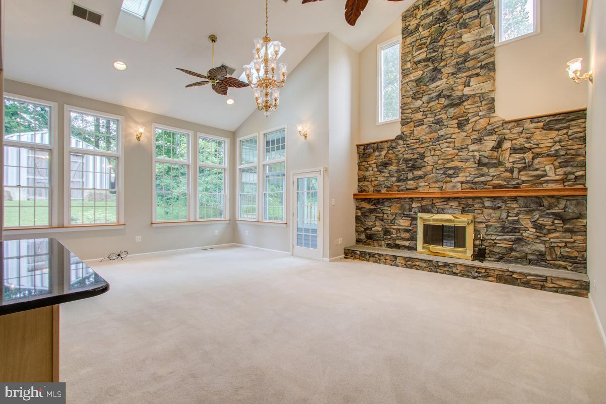109 Summit Hall Road Gaithersburg, MD 20877 - Photo 10 of 57 Two story fireplace