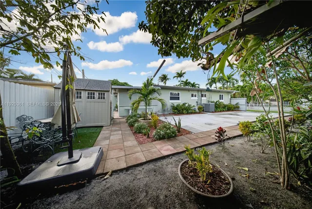 a view of hallway with furniture