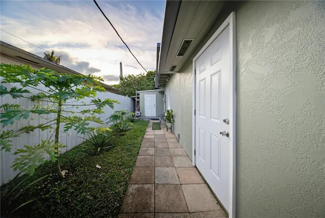 a view of a garden with a tree