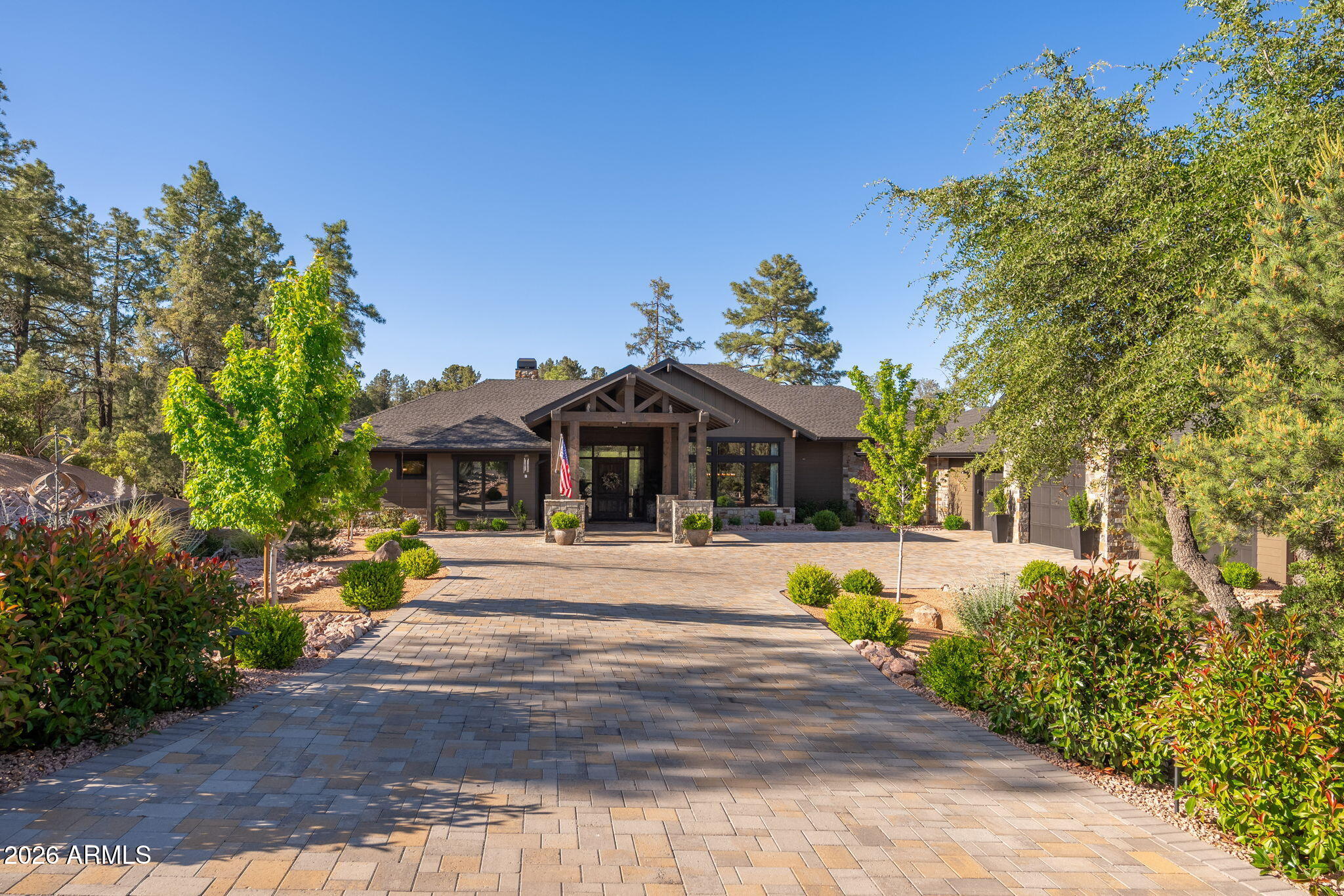 602 North Redbud Circle Payson, AZ 85541 - Photo 2 of 83 a front view of a house with a garden