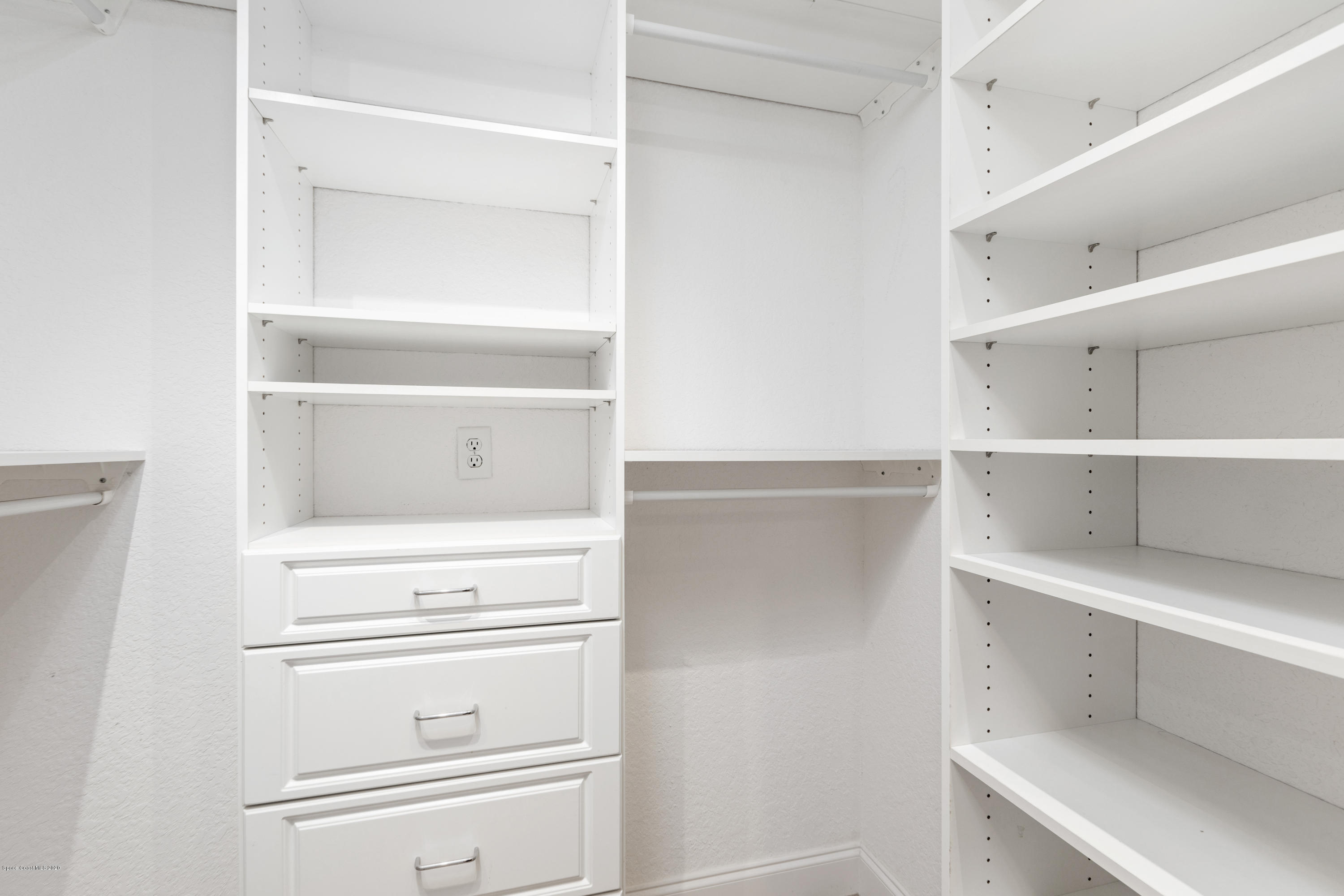839 Knecht Road Northeast Palm Bay, FL 32905 - Photo 22 of 37 a view of an empty walk in closet