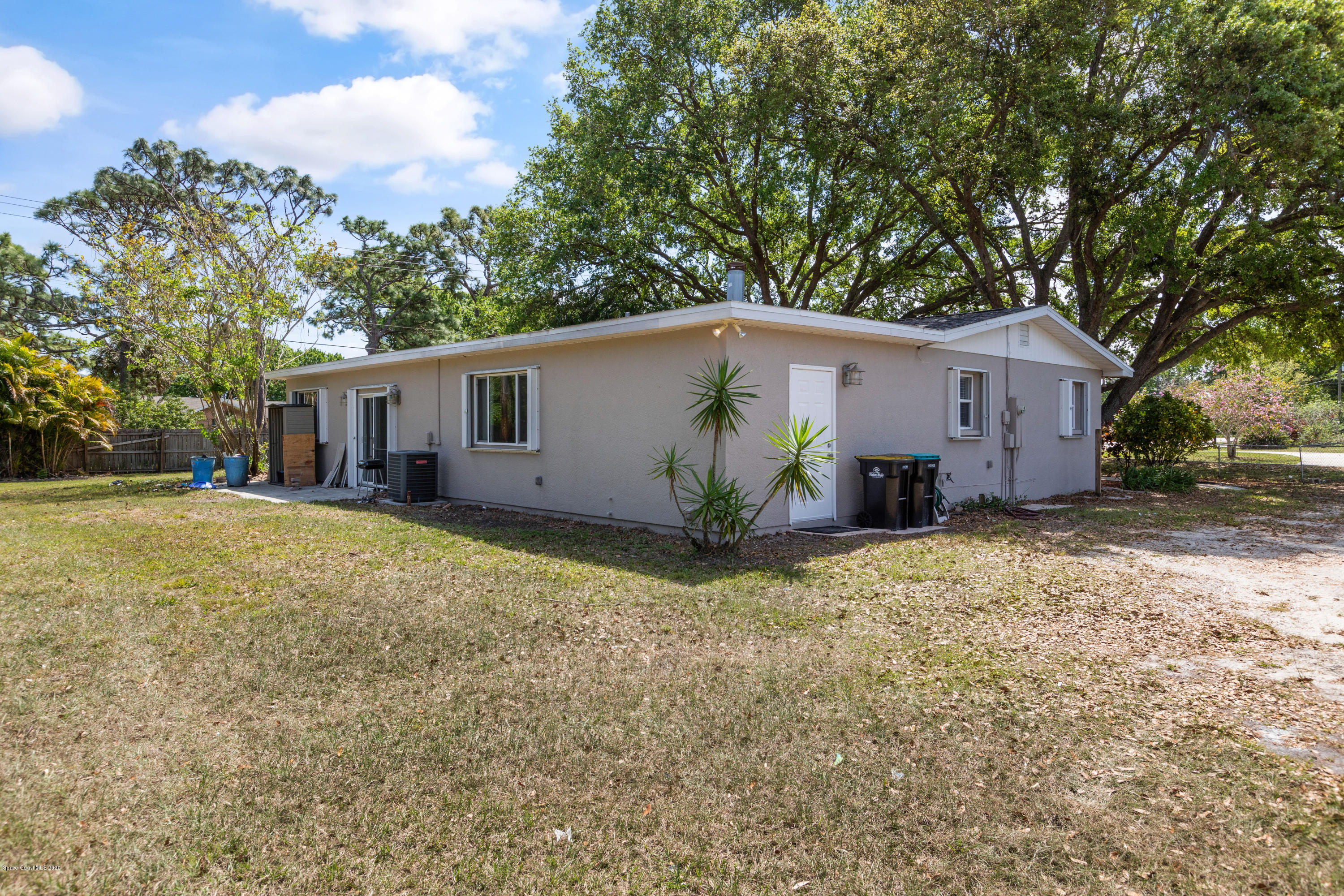 839 Knecht Road Northeast Palm Bay, FL 32905 - Photo 33 of 37 a house view with a garden space