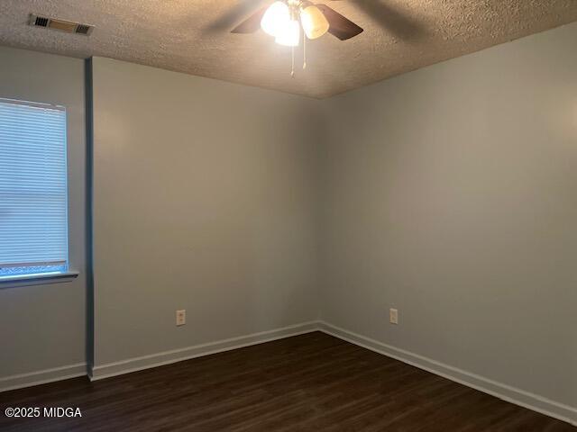 1123 Sandy Beach Drive Macon, GA 31220 - Photo 12 of 16 a view of an empty room with wooden floor and a window