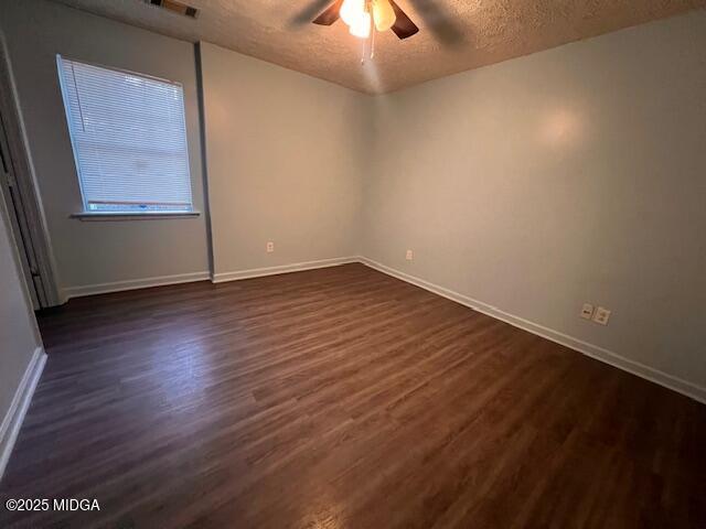 1123 Sandy Beach Drive Macon, GA 31220 - Photo 13 of 16 an empty room with wooden floor and windows