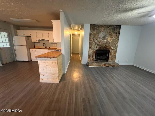 1123 Sandy Beach Drive Macon, GA 31220 - Photo 3 of 16 a living room with stainless steel appliances furniture wooden floor and a fireplace