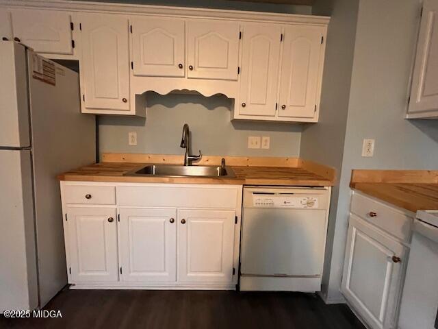 1123 Sandy Beach Drive Macon, GA 31220 - Photo 6 of 16 a kitchen with white cabinets and white appliances