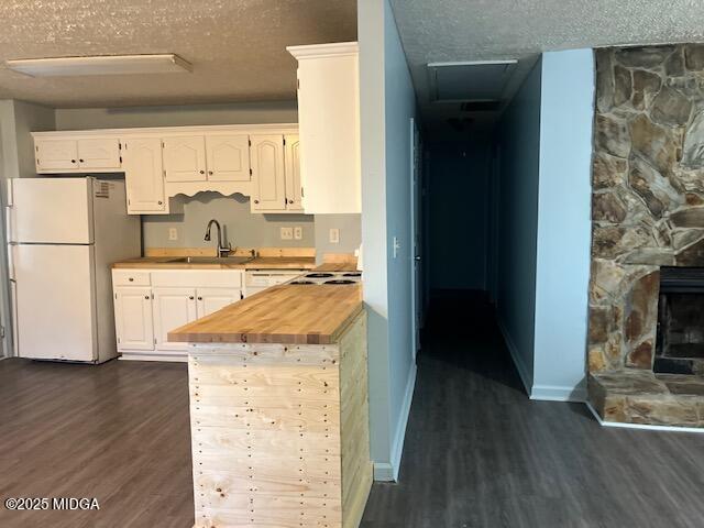 1123 Sandy Beach Drive Macon, GA 31220 - Photo 7 of 16 a kitchen with a sink a stove and refrigerator