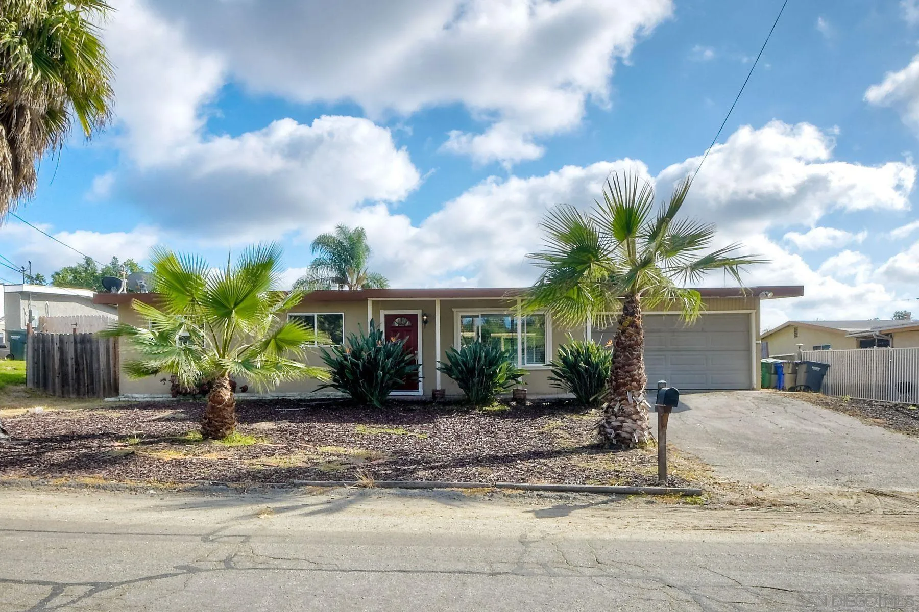 1220 Bluegrass Road Vista, CA 92083 - Photo 1 of 25 a front view of a house with garden