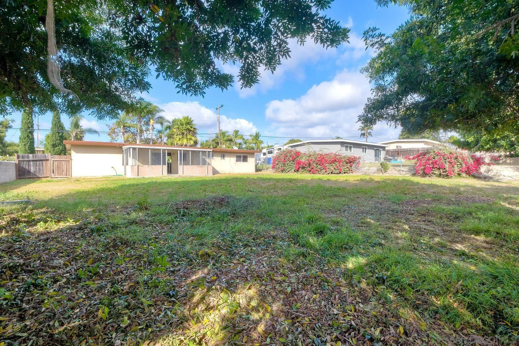 1220 Bluegrass Road Vista, CA 92083 - Photo 23 of 25 a view of yard with swimming pool and green space