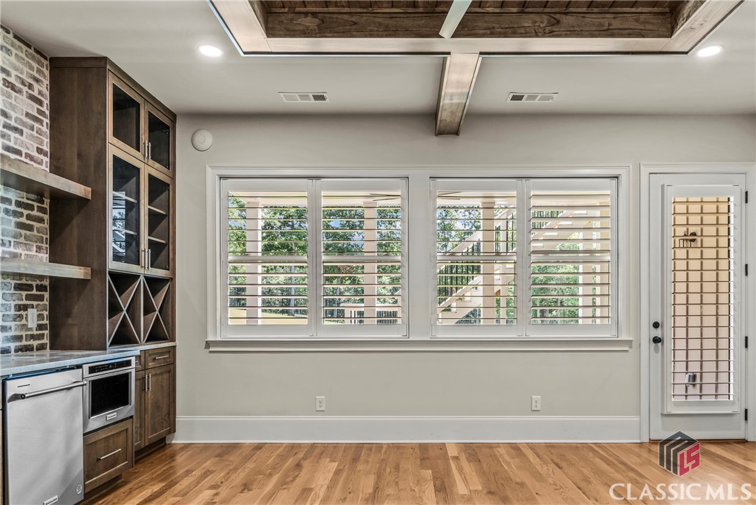 902 Indigo Bunting Road Statham, GA 30666 - Photo 34 of 50 Downstairs den with view of golf course