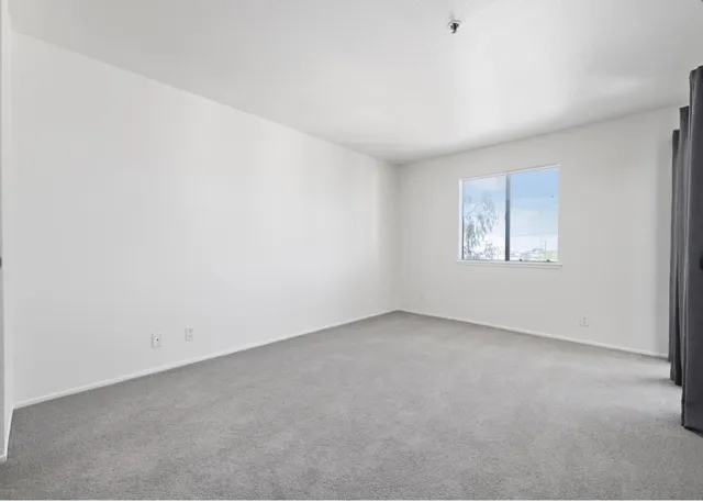 an empty room with a window