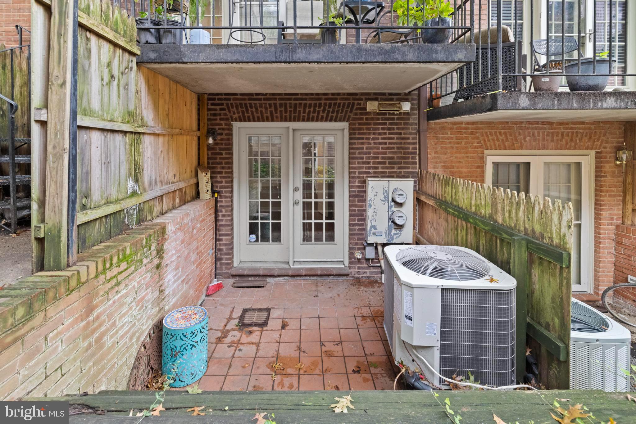 4613 MacArthur Boulevard Northwest, Unit A Washington, DC 20007 - Photo 20 of 21 a front view of a house with garden