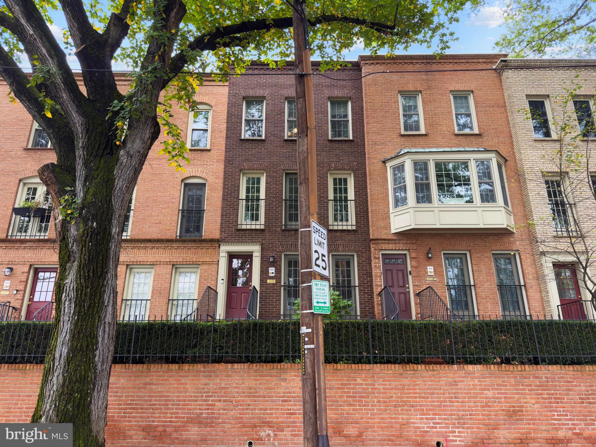 4613 MacArthur Boulevard Northwest, Unit A Washington, DC 20007 - Photo 4 of 21 front view of a brick house