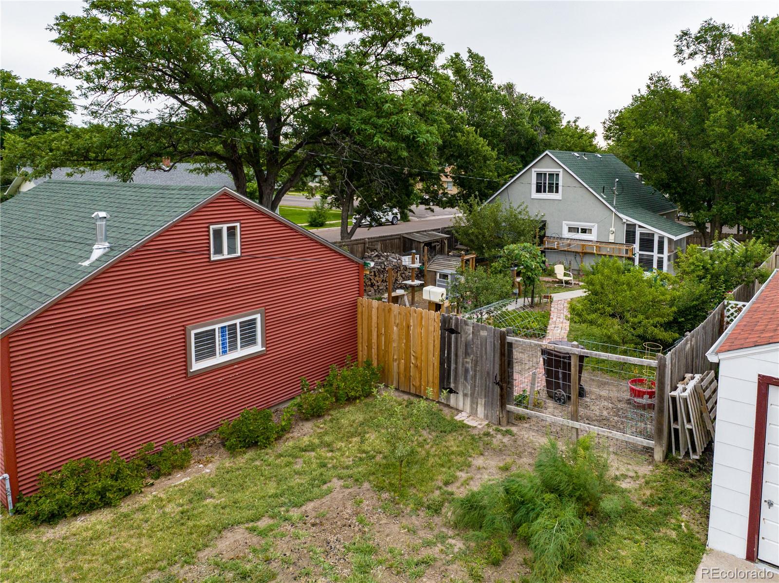 581 Bent Avenue Akron, CO 80720 - Photo 15 of 23 a front view of house with yard and green space