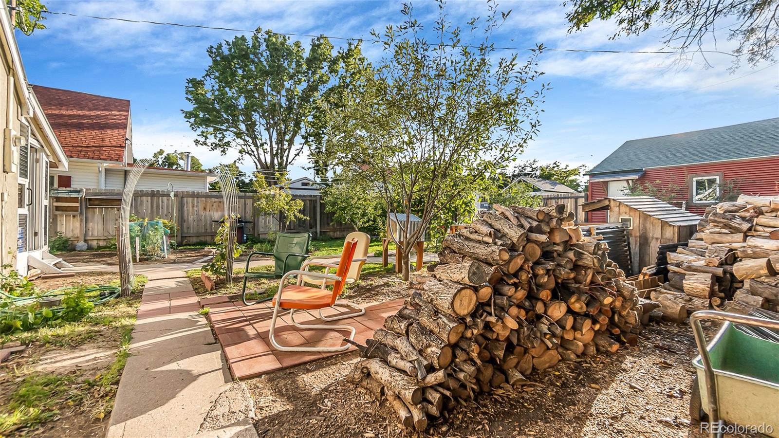 581 Bent Avenue Akron, CO 80720 - Photo 18 of 23 a view of a backyard with sitting area