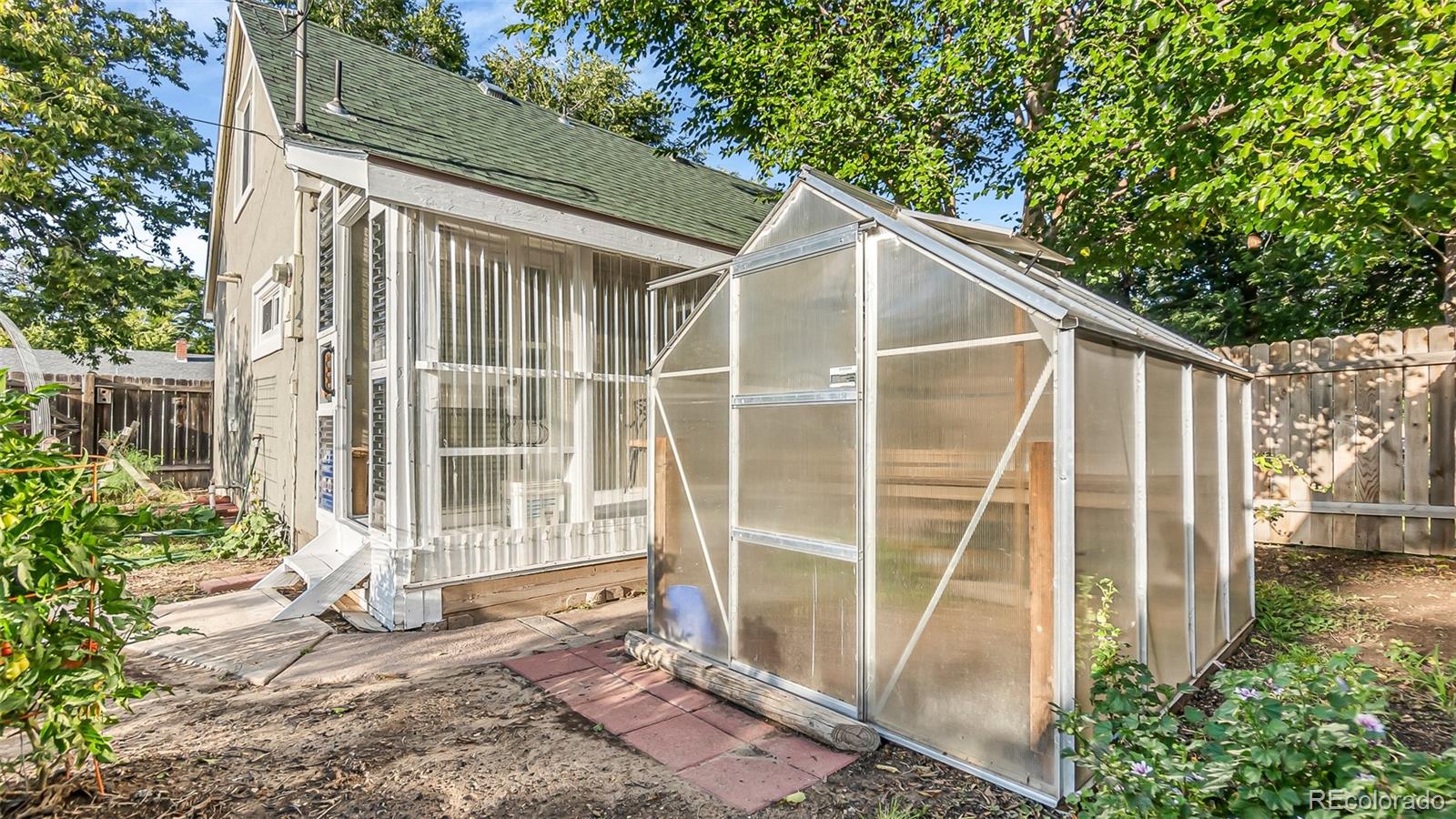 581 Bent Avenue Akron, CO 80720 - Photo 19 of 23 a view of a house with backyard and porch
